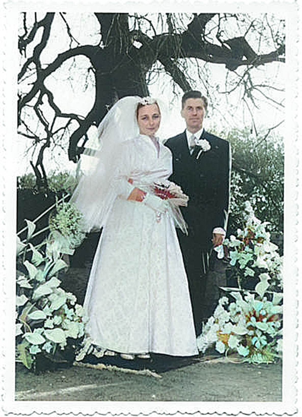 Une image contenant robe de mariée, mariée, habits, personne
Description générée automatiquement